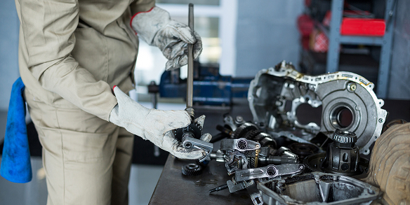 mechanic fixing a car